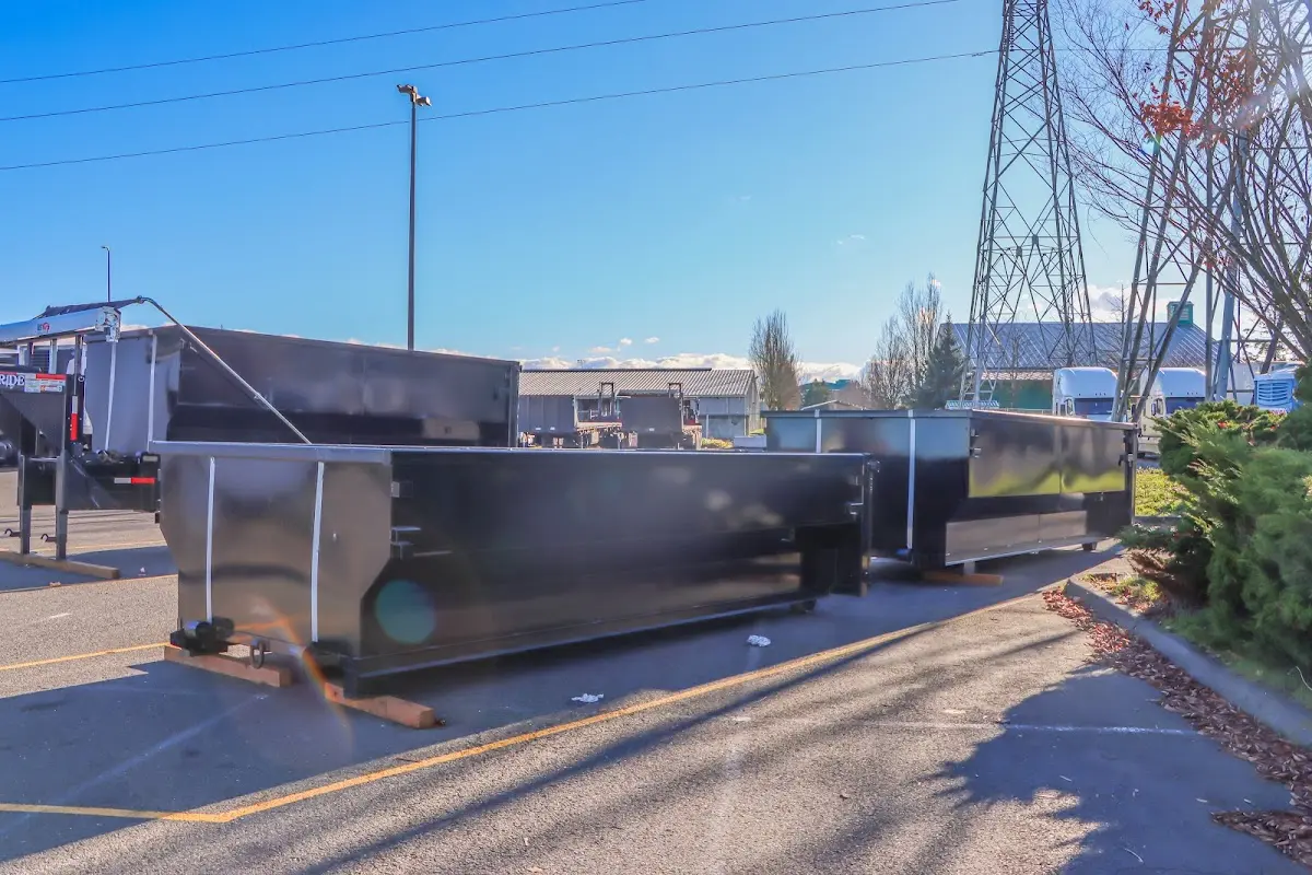 Roll-off dumpster ready for waste disposal at job site for 8 Yard Dumpster Rental in Lower Salford
